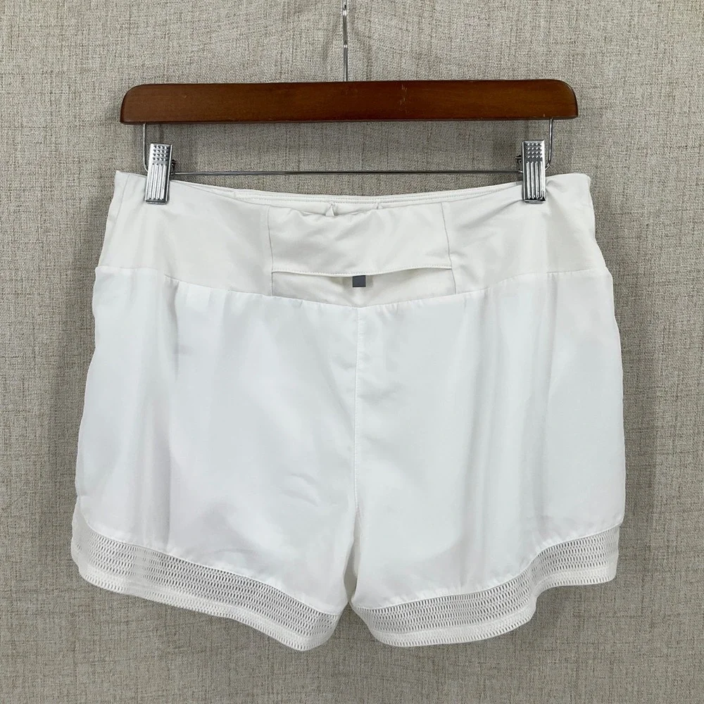 Nike Dri-FIT Running Shorts Womens M‎ White Mesh Trim Zip Pocket Lightweight